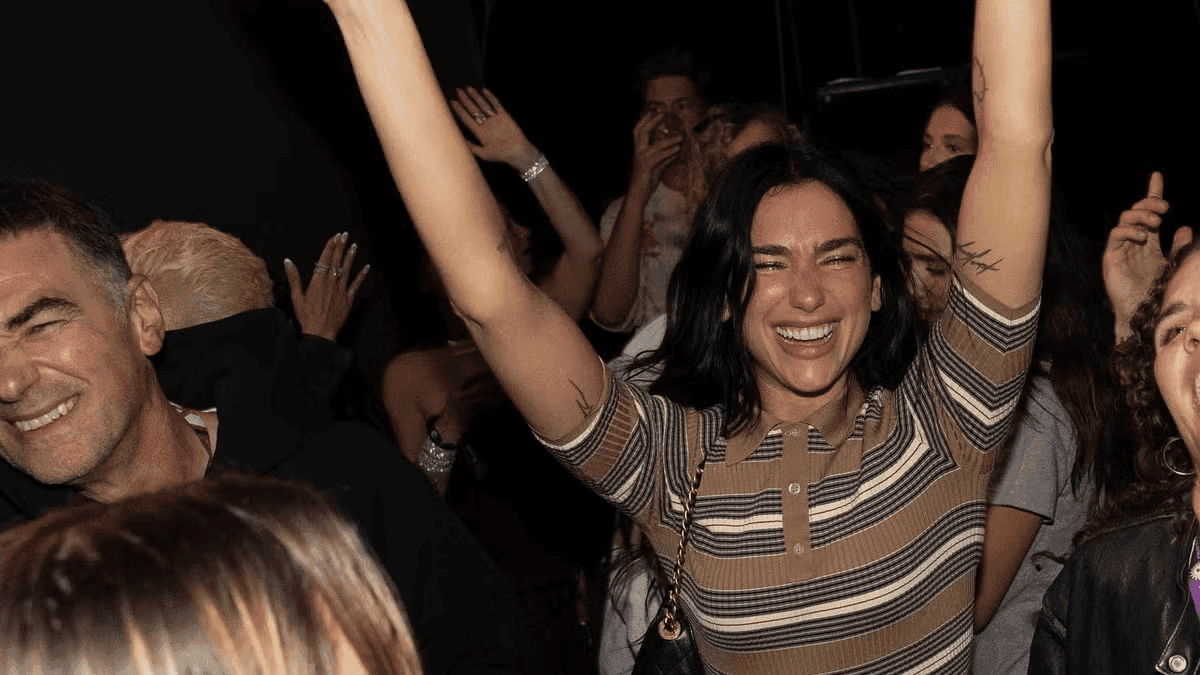 Dua Lipa Goes All In on Festival Style with Ribbed Prada Mini Co-ord